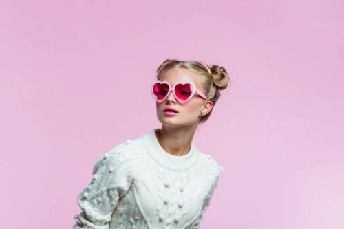 beautiful teenege girl wearing heart shaped sunglasses - fashion stock pictures, royalty-free photos & images