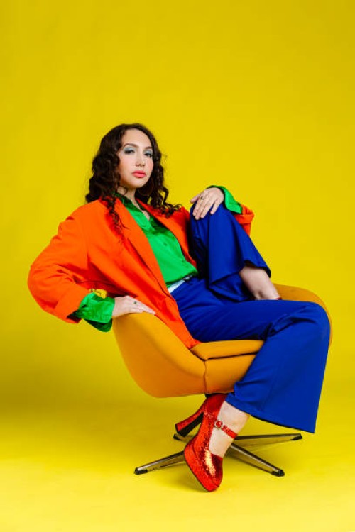 beautiful woman dresses in colorful outfit - fashion stock pictures, royalty-free photos & images