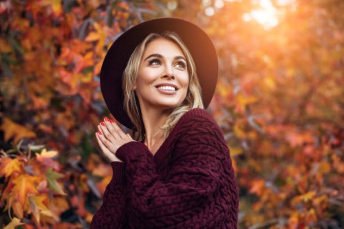 beautiful woman enjoying in a sunny autumn day - fashion stock pictures, royalty-free photos & images