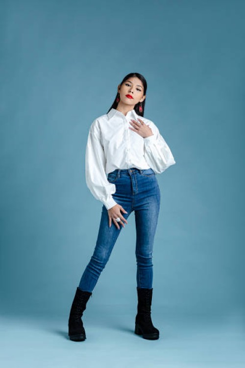 beautiful woman front of plain background - fashion photos et images de collection