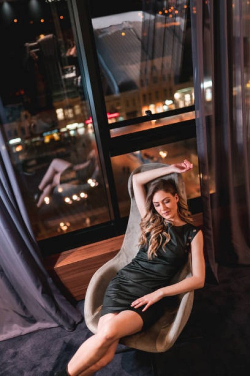 beautiful woman posing in fashionable dress - fashion stock pictures, royalty-free photos & images
