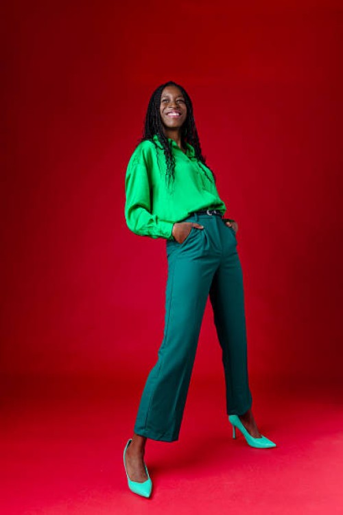 beautiful woman wearing green outfit - fashion stock pictures, royalty-free photos & images