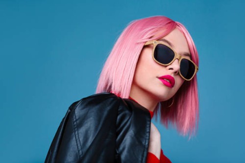 beautiful woman with pink hair - fashion stock pictures, royalty-free photos & images