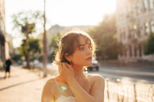 beautiful young woman walking on the city street during summer - fashion stock pictures, royalty-free photos & images