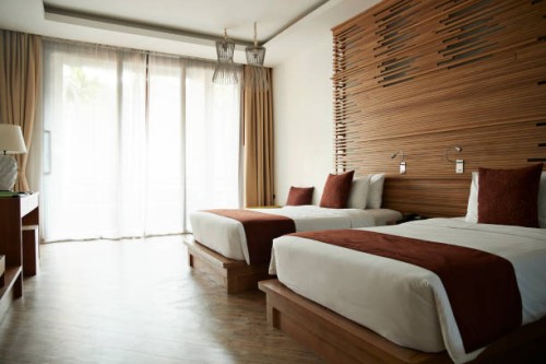 beds in hotel room at tourist resort - home decoration stock pictures, royalty-free photos & images