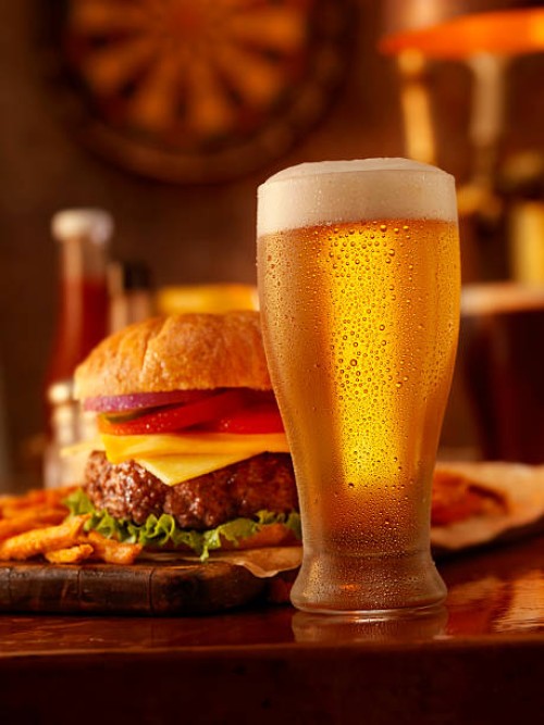beer and a burger - food stock pictures, royalty-free photos & images