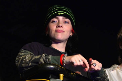 Billie Eilish watches her brother Finneas O'Connell perform at Electric Ballroom on August 30, 2023 in London, England.