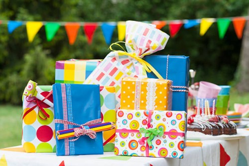 birthday present on garden table - garden decoration stock pictures, royalty-free photos & images
