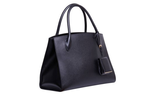 black leather women's handbag on white background - fashion stock pictures, royalty-free photos & images