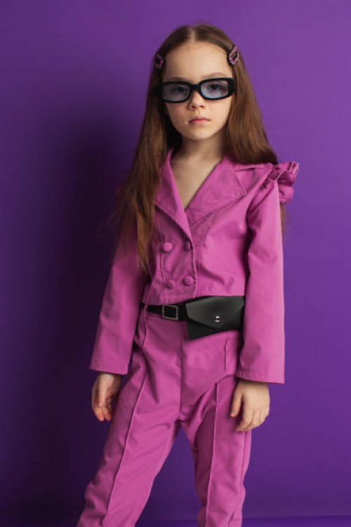 blonde girl in studio in sunglasses and purple suit on violet background. child. childhood. summer fashion. hairstyle - fashion stock pictures, royalty-free photos & images