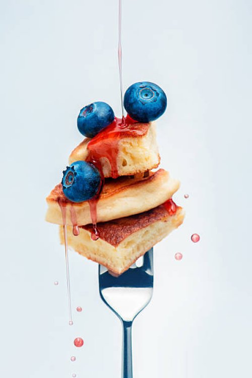 blueberry pancakes with syrup on fork - food stock pictures, royalty-free photos & images
