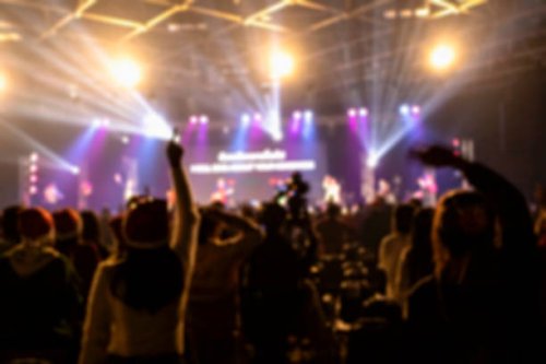 blurred background of people at christmas party - concert stock pictures, royalty-free photos & images
