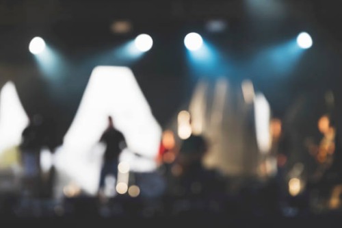 blurred image of a rock concert. unrecognizable people on the stage - concert stock pictures, royalty-free photos & images