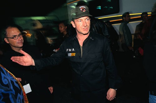 Bono, the lead singer of U2, prepares to perform at the NetAid Concert, to help fight extreme poverty.