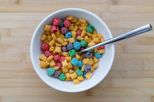 bowl of colorful breakfast cereal - junk food stock pictures, royalty-free photos & images