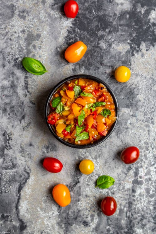 bowl of tomato basil dip - junk food stockfoto's en -beelden