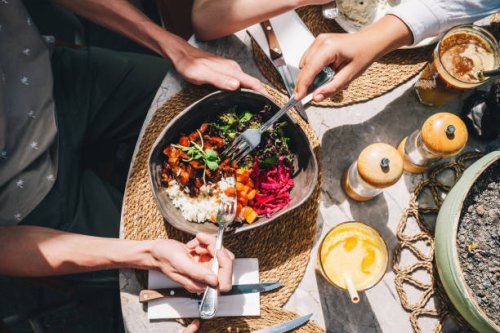 bowl with healthy food. fresh vegetables, beef and rice in a big plate. sunny day, serving a meal in a cafe. - food stock pictures, royalty-free photos & images