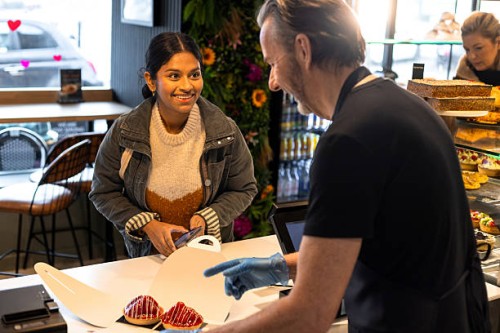 boxing up strawberry tarts - junk food stock pictures, royalty-free photos & images