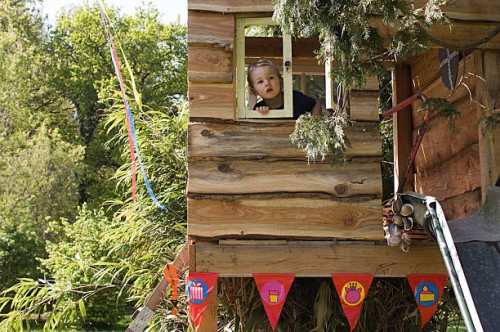 boy in a treehouse - garden decoration stock pictures, royalty-free photos & images