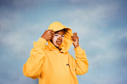 boy with vitiligo wearing yellow hoodie - fashion stock pictures, royalty-free photos & images