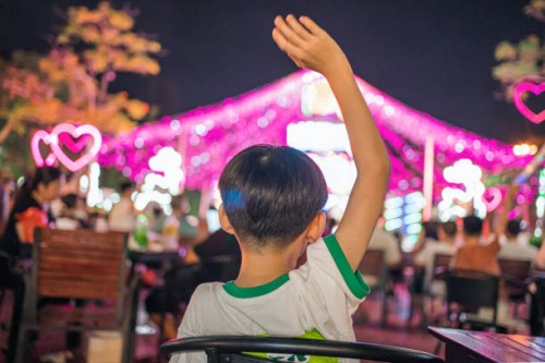boys watch outdoor singing performances. - concert stock pictures, royalty-free photos & images