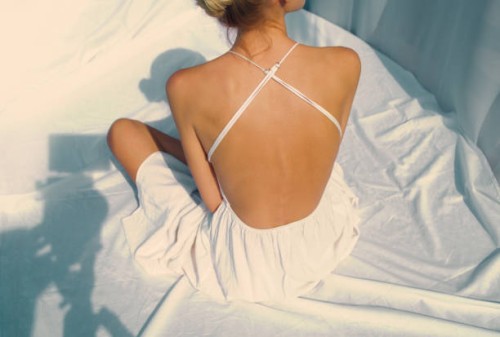 brand new pictures for my profile. woman posing in seductive dress with naked back - fashion stock pictures, royalty-free photos & images