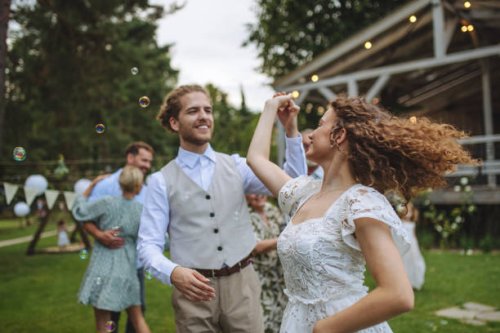 bride and groom dancing at small garden wedding. - garden decoration stock pictures, royalty-free photos & images