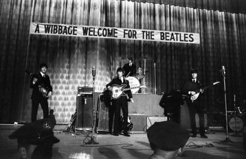 British pop group the Beatles perform onstage at Convention Hall during their first US tour, Philadelphia, Pennsylvania, September 2, 1964. Pictured...