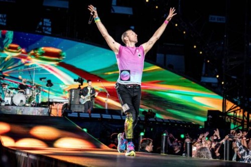 British singer Chris Martin of British band Coldplay performs at Parken Stadium in Copenhagen, on July 5, 2023. The concert is part of the Music of...