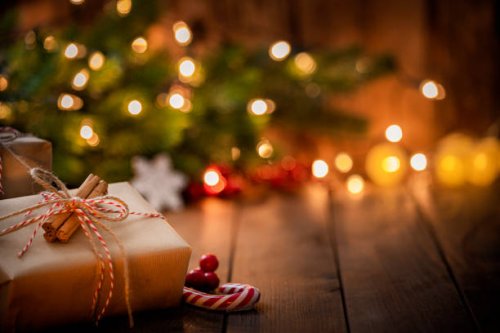 brown christmas gift box on rustic wooden table. - home decoration stock pictures, royalty-free photos & images