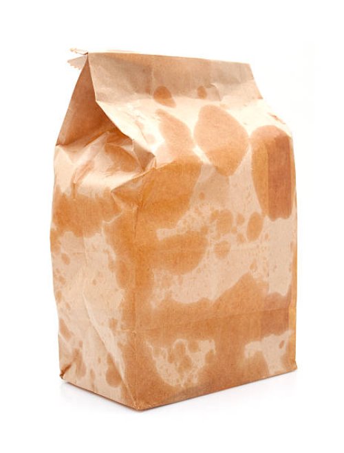 brown paper bag isolated on white background - junk food stock pictures, royalty-free photos & images