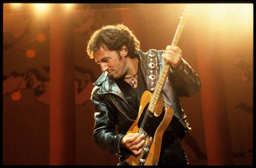 Bruce Springsteen performs on stage at an Amnesty International concert at Wembley Stadium, London, 2nd September 1988.