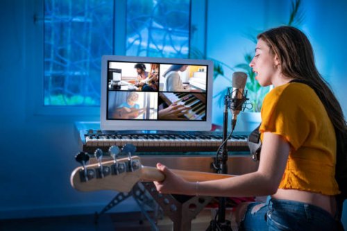 brunette teen musician singer girl singing and playing bass guitar teleconference - concert stock pictures, royalty-free photos & images