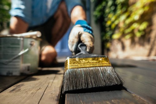 brush and organic oil for saving thewooden deck outdoor. - home decoration stock pictures, royalty-free photos & images
