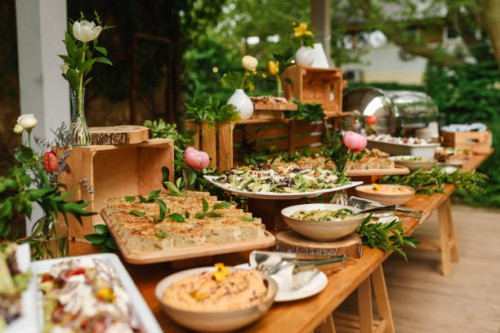 buffet food for party decorated with fresh plants. - food stock pictures, royalty-free photos & images