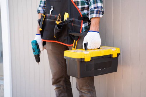 builder handyman with drill and construction tools. - home decoration stock pictures, royalty-free photos & images