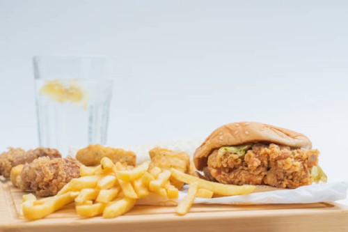 burger fries chicken wraps - junk food stock pictures, royalty-free photos & images