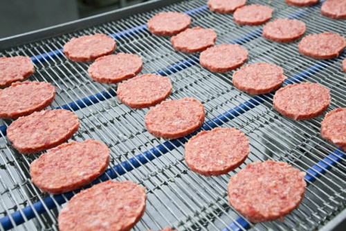 burgers on conveyor - food stock pictures, royalty-free photos & images
