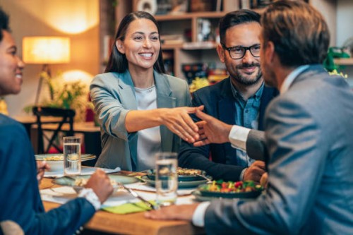 business handshake at the restaurant - food stock pictures, royalty-free photos & images