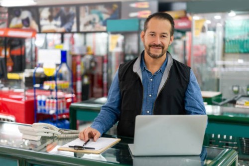 business manager looking happy working at a hardware store - home decoration stock pictures, royalty-free photos & images