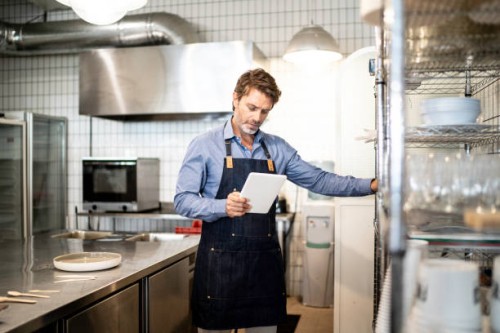 business owner checking kitchen supplies - food stock pictures, royalty-free photos & images