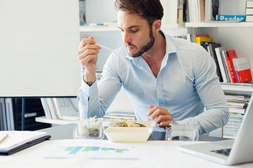 businessman have lunch break in office. - junk food stock pictures, royalty-free photos & images