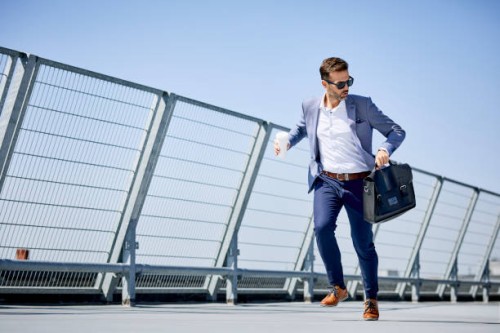 businessman with coffee and briefcase running - junk food stock pictures, royalty-free photos & images