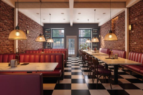 cafe interior with red seats, marble tables, pendant lights and brick walls - junk food stock pictures, royalty-free photos & images