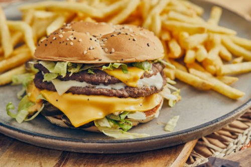 cafeteria double beef burger gourmet - junk food stock pictures, royalty-free photos & images