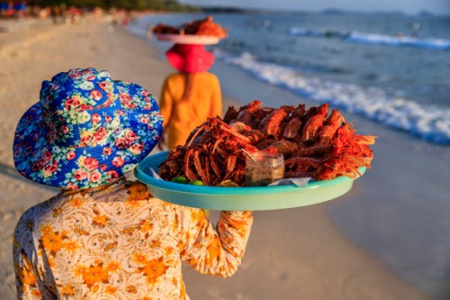 cambodian women selling fresh lobsters on the beach, sihanoukville, cambodia - food stock pictures, royalty-free photos & images