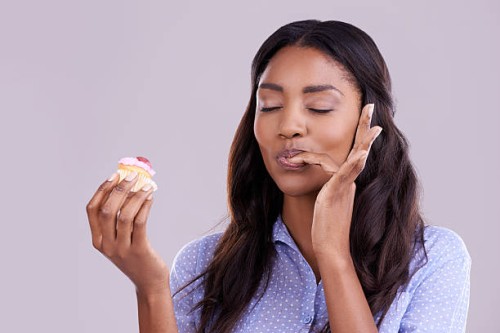 can't talk, in the cupcake zone - food stock pictures, royalty-free photos & images