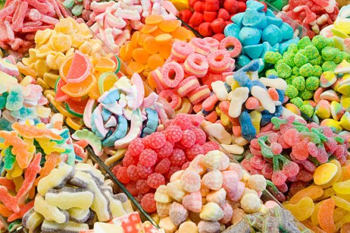 candies at la boqueria market in barcelona - junk food stock pictures, royalty-free photos & images
