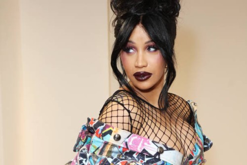 Cardi B poses backstage following the Andreas Kronthaler for Vivienne Westwood show during Paris Fashion Week Womenswear Spring-Summer 2025 on...