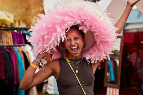 carefree woman wearing pink hat while shouting - concert stock pictures, royalty-free photos & images